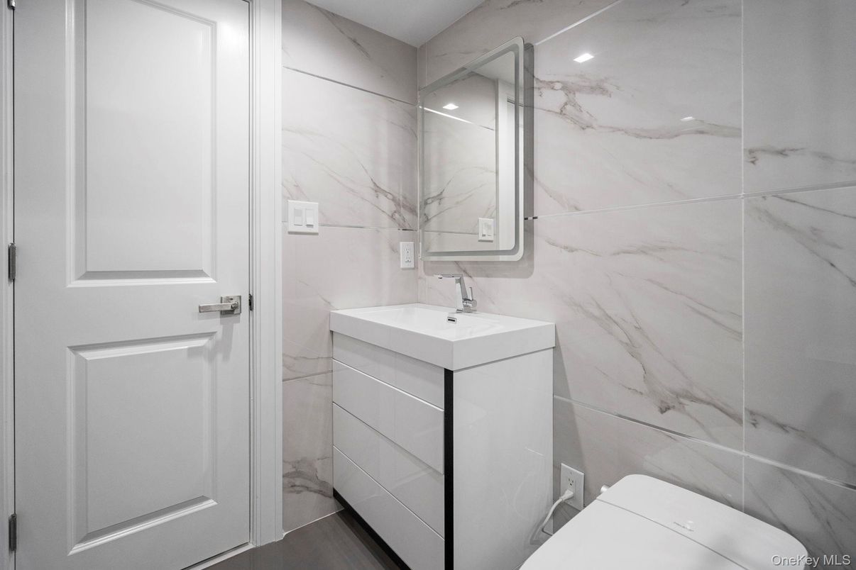 Bathroom, Interior, Marble Walls, Recessed Lighting, Wood Texture Flooring