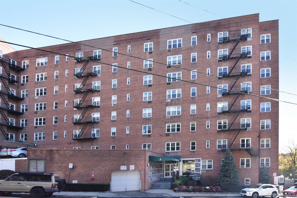 Exterior, Facade, Brick Facade, Condo Building