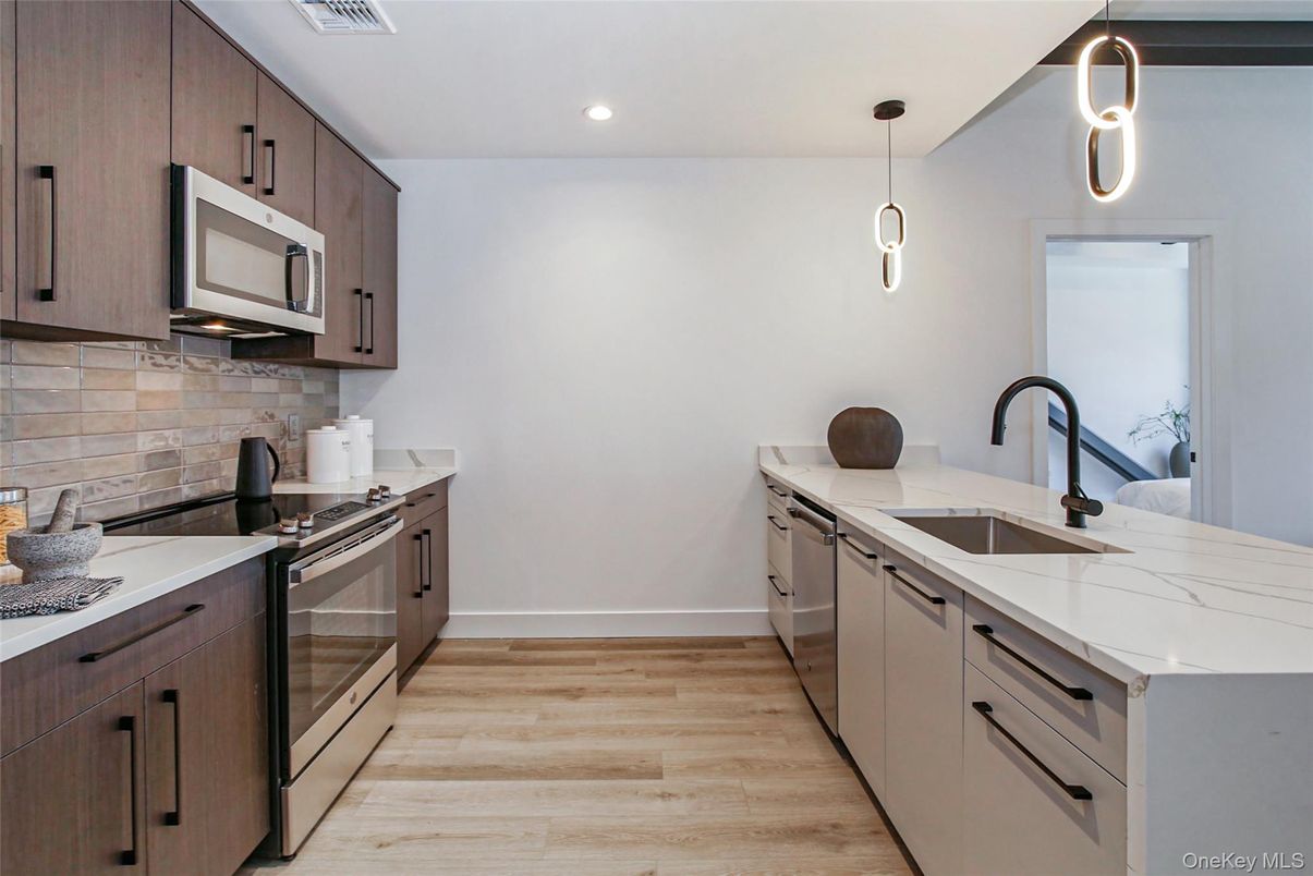 Interior, Kitchen, Pendant Lights, Recessed Lighting, Stainless Steel Appliances, Wood Texture Flooring
