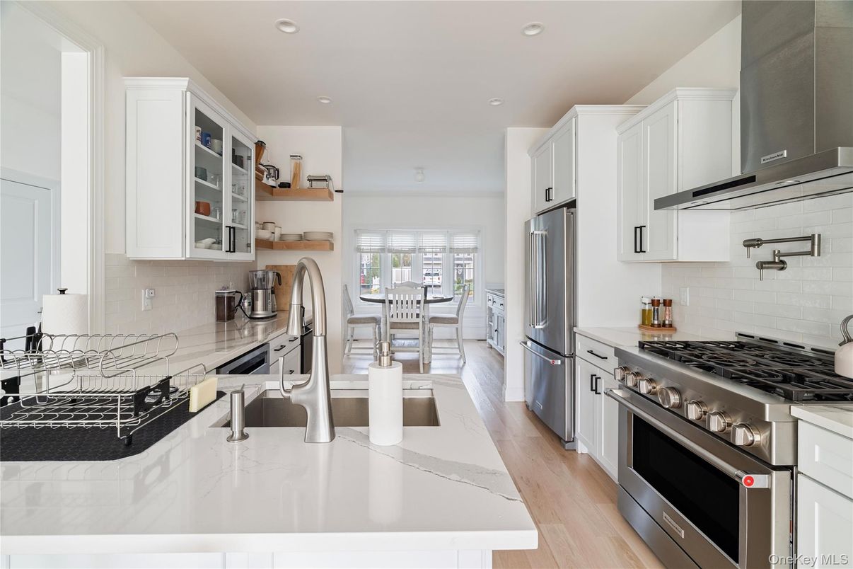 Dining room, Interior, Kitchen, Recessed Lighting, Stainless Steel Appliances, Wood Texture Flooring