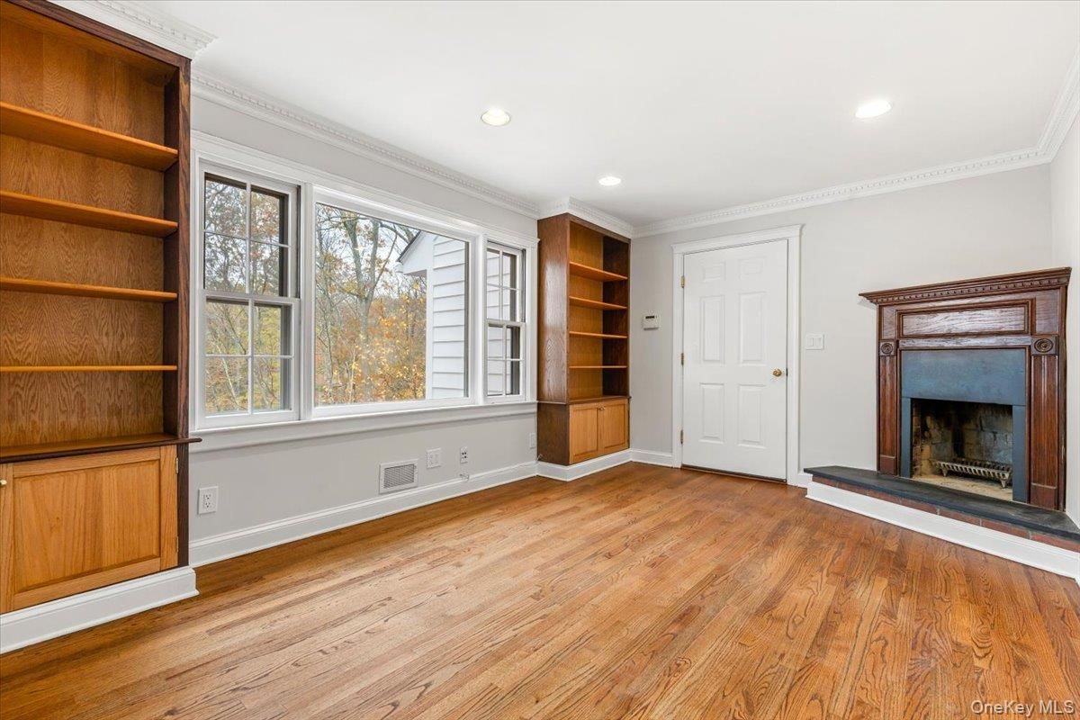 Empty room, Fireplace, Interior, Recessed Lighting, Wood Texture Flooring