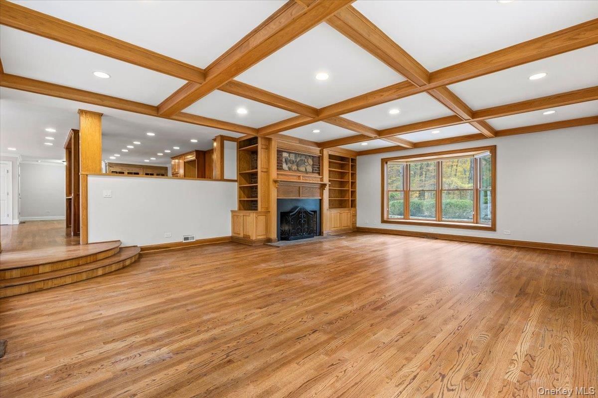 Empty room, Fireplace, Interior, Recessed Lighting, Wooden Beams, Wood Texture Flooring
