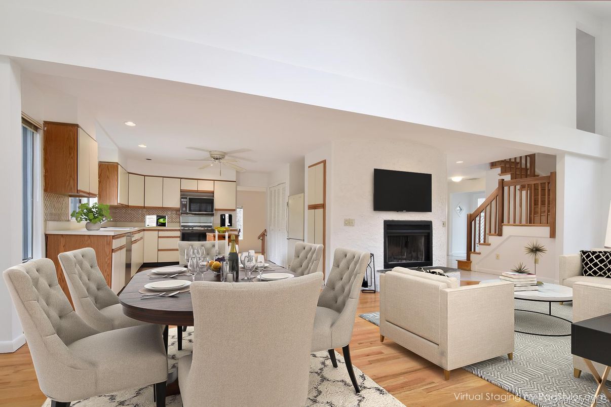 Dining room, Fireplace, Interior, Kitchen, Living room, Recessed Lighting, Stainless Steel Appliances, Wood Texture Flooring