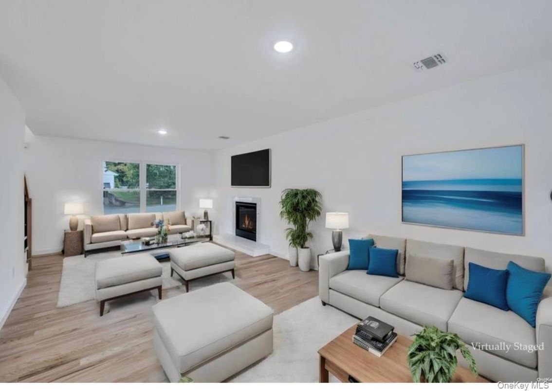 Fireplace, Interior, Living room, Recessed Lighting, Wood Texture Flooring