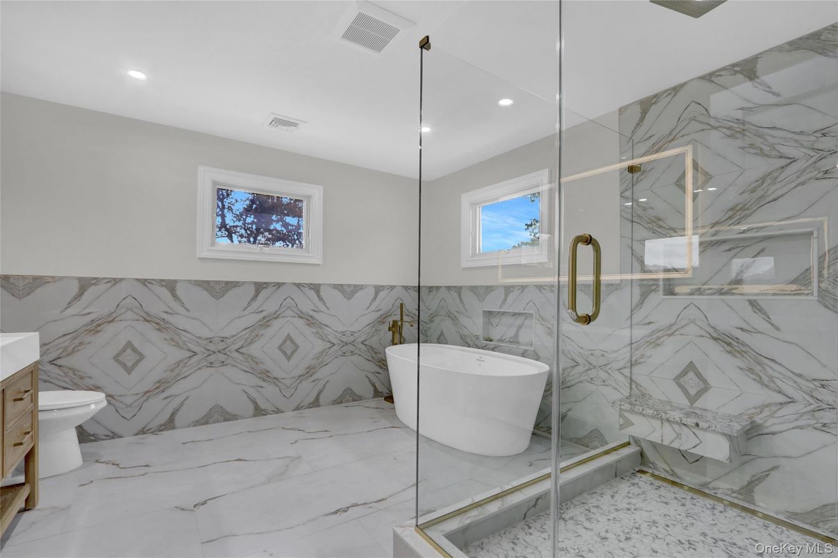 Bathroom, Free Standing Baths, Glass Shower, Interior, Marble, Marble Walls, Recessed Lighting