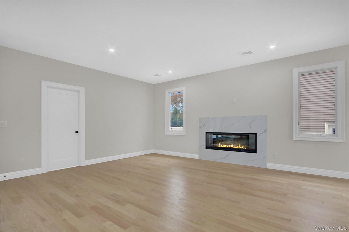 Empty room, Fireplace, Interior, Recessed Lighting, Wood Texture Flooring