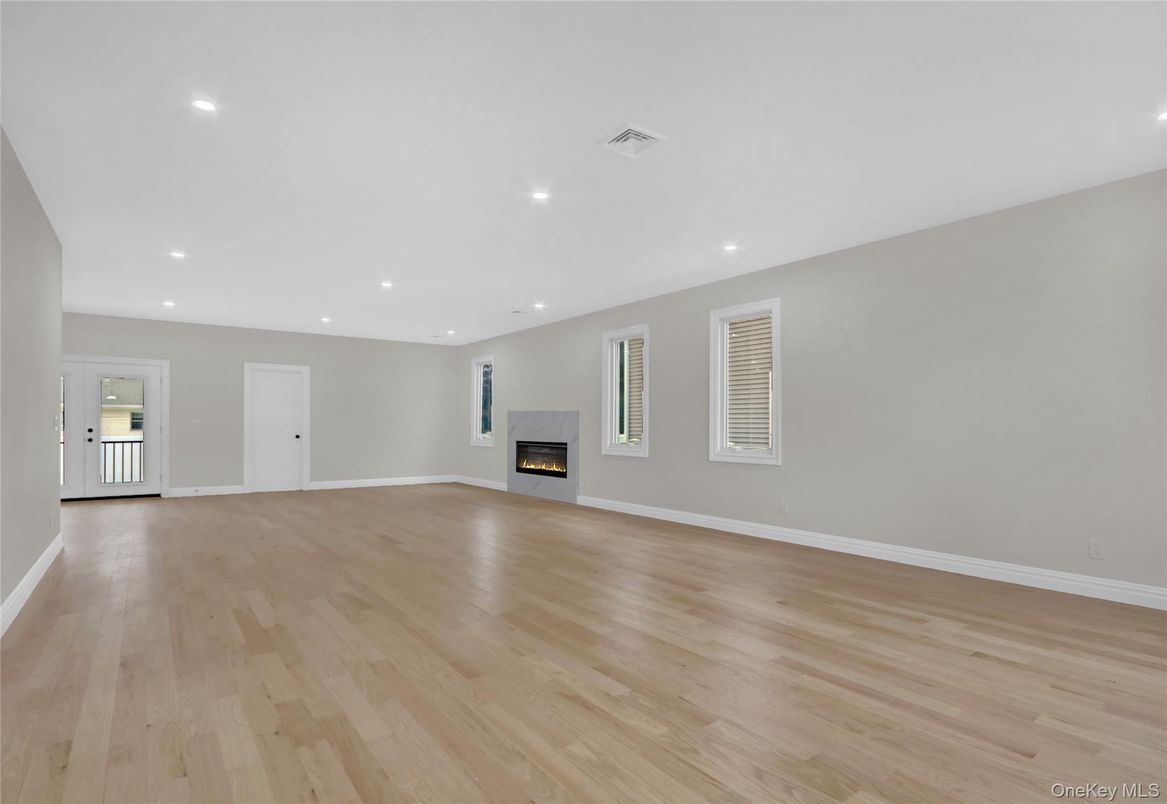 Empty room, Fireplace, Interior, Recessed Lighting, Wood Texture Flooring