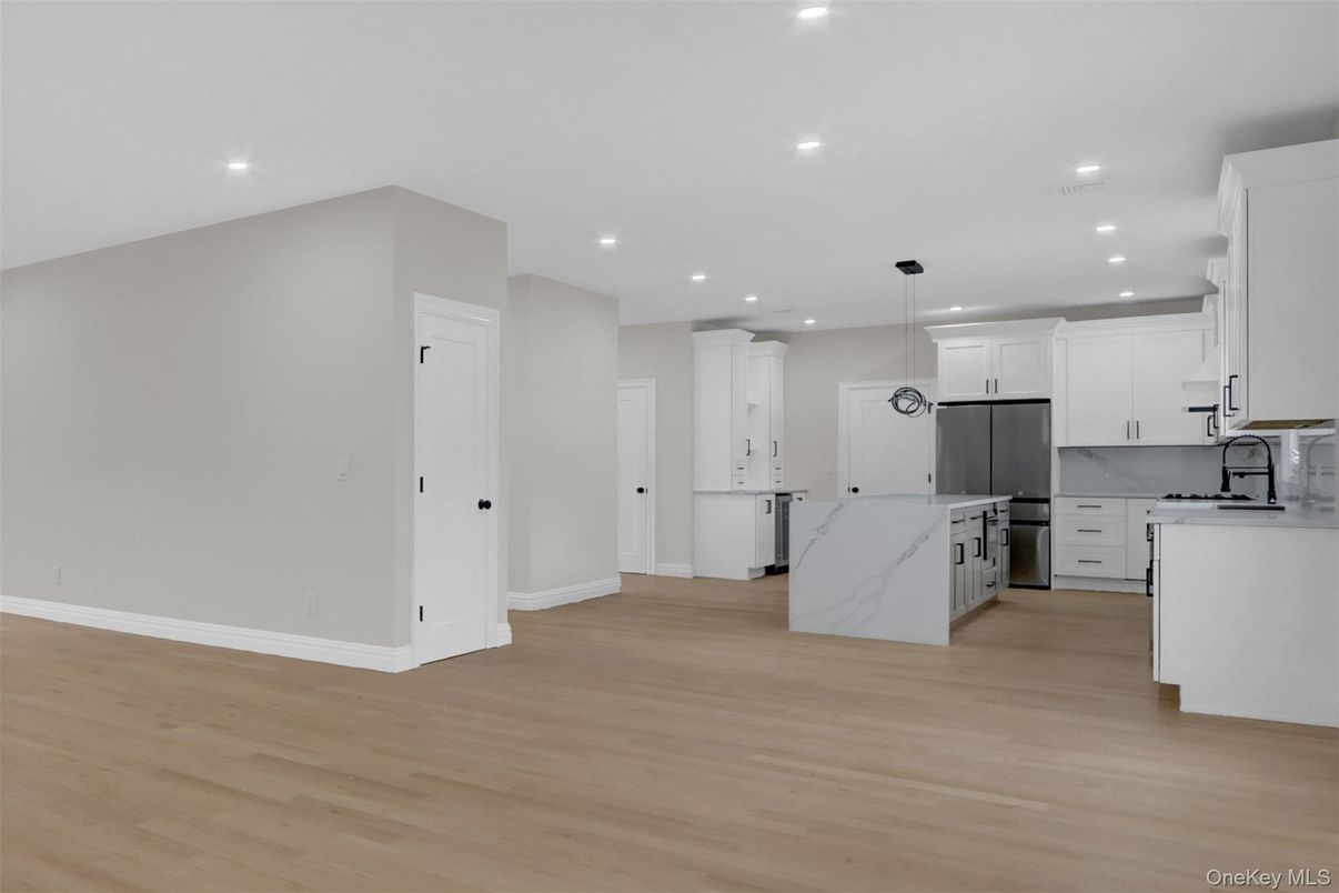 Interior, Kitchen, Marble Walls, Pendant Lights, Recessed Lighting, Wood Texture Flooring