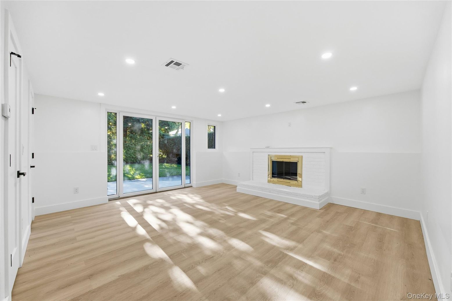 Empty room, Fireplace, Interior, Recessed Lighting, Wood Texture Flooring