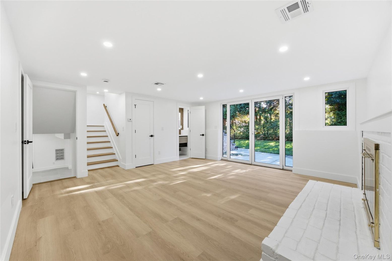 Empty room, Fireplace, Interior, Recessed Lighting, Wood Texture Flooring