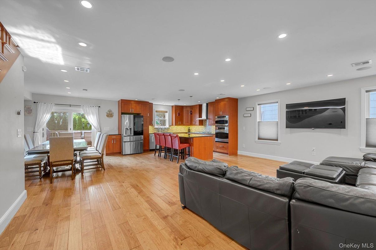 Dining room, Interior, Kitchen, Living room, Recessed Lighting, Stainless Steel Appliances, Wood Texture Flooring