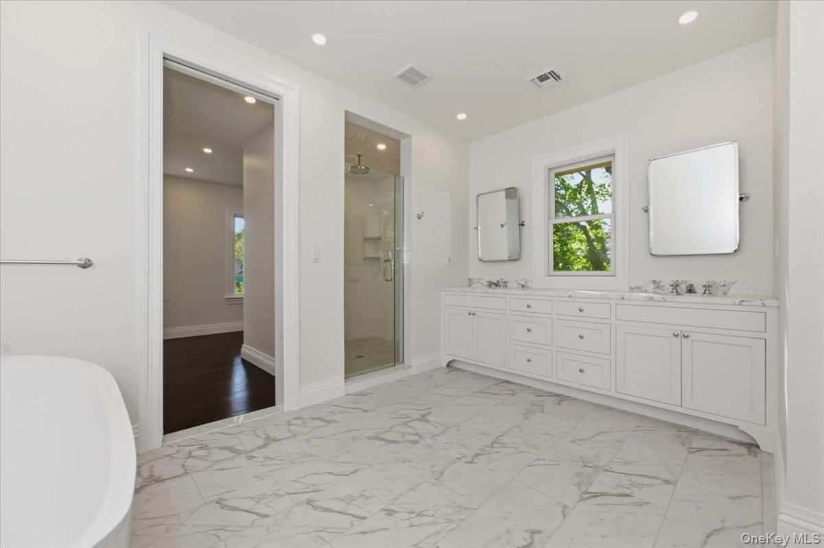 Bathroom, Dual Sink Vanities, Glass Shower, Interior, Marble, Recessed Lighting