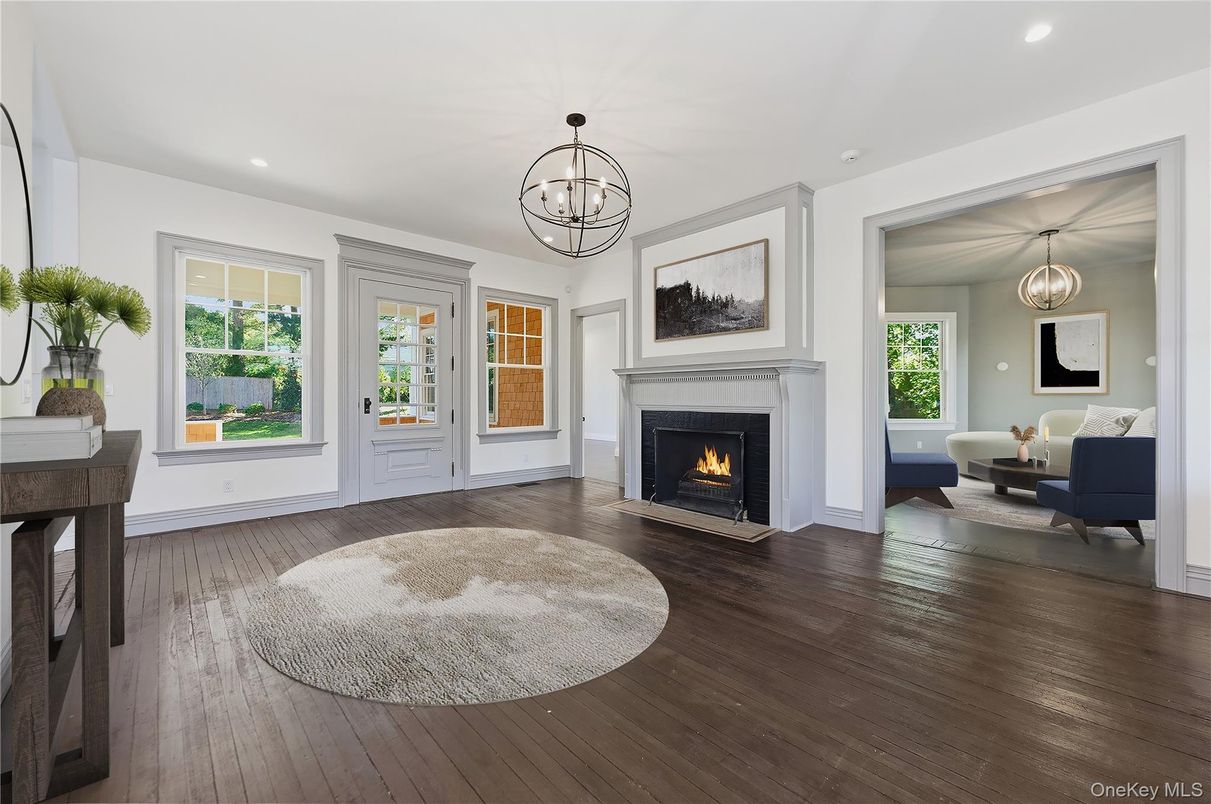 Chandelier, Fireplace, Interior, Living room, Pendant Lights, Recessed Lighting, Wood Texture Flooring