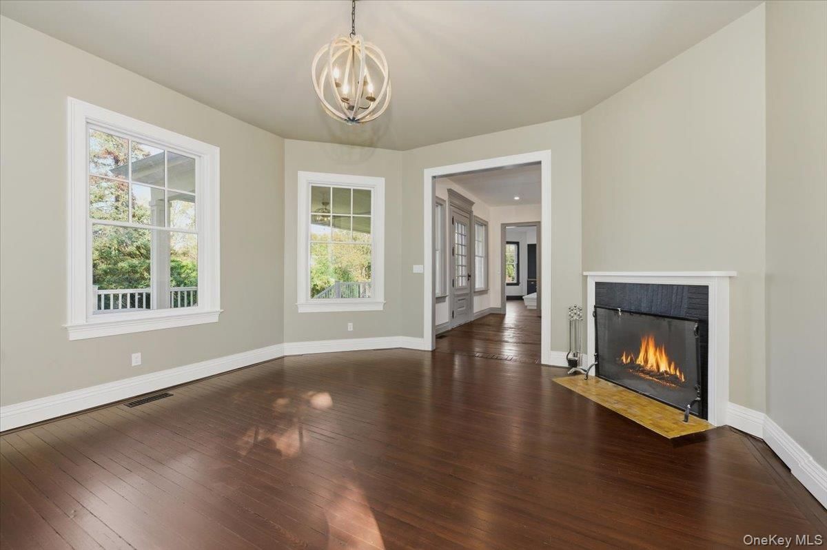 Empty room, Fireplace, Interior, Pendant Lights, Recessed Lighting, Wood Texture Flooring