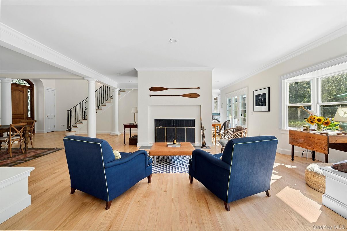 Dining room, Fireplace, Interior, Living room, Recessed Lighting, Wood Texture Flooring