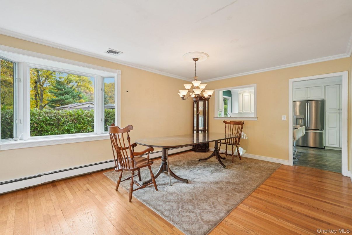 Chandelier, Dining room, Interior, Kitchen, Stainless Steel Appliances, Wood Texture Flooring