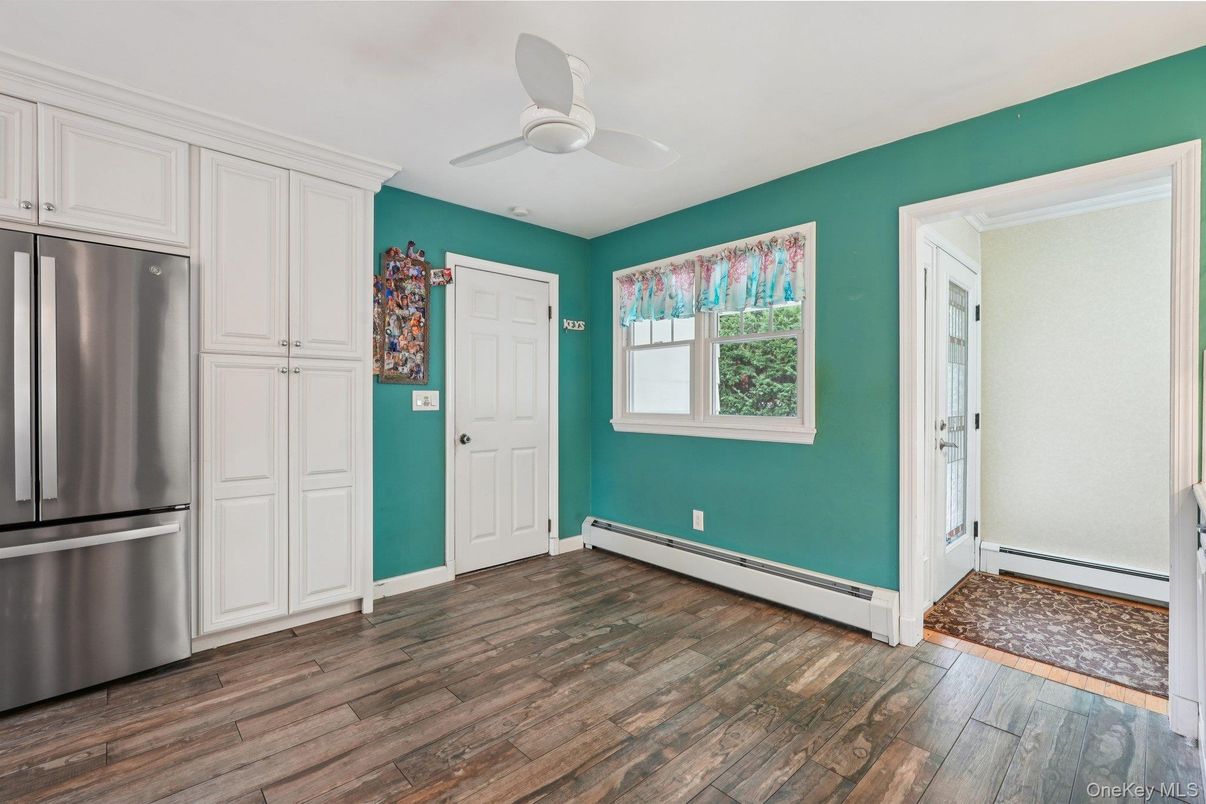 Empty room, Interior, Kitchen, Stainless Steel Appliances, Wood Texture Flooring