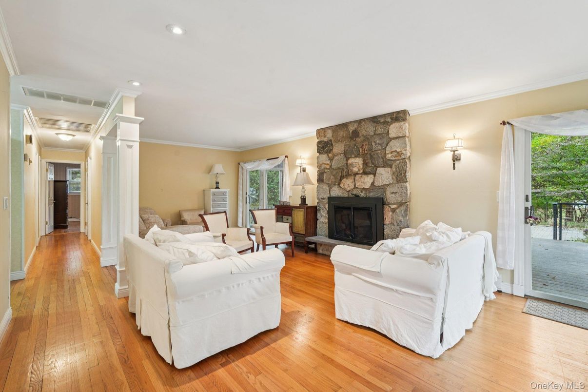 Bedroom, Fireplace, Interior, Recessed Lighting, Stone Walls, Wood Texture Flooring