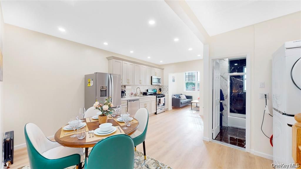 Dining room, Interior, Kitchen, Living room, Recessed Lighting, Stainless Steel Appliances, Wood Texture Flooring