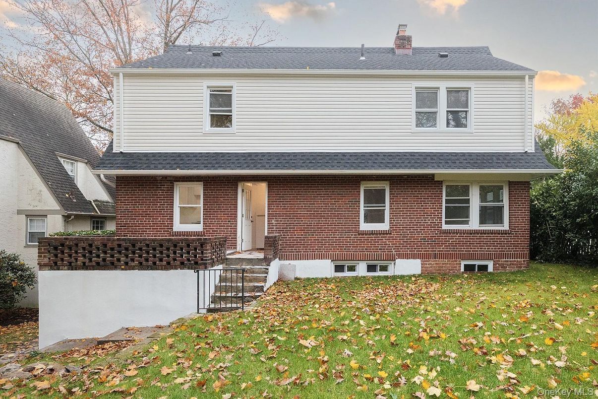 Exterior, Facade, Brick Facade, American Foursquare