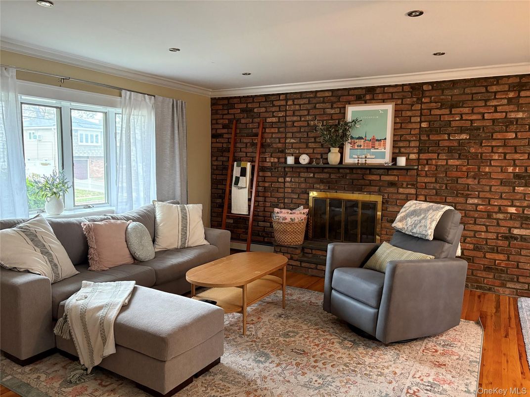 Fireplace, Interior, Living room, Recessed Lighting, Stone Walls, Wood Texture Flooring