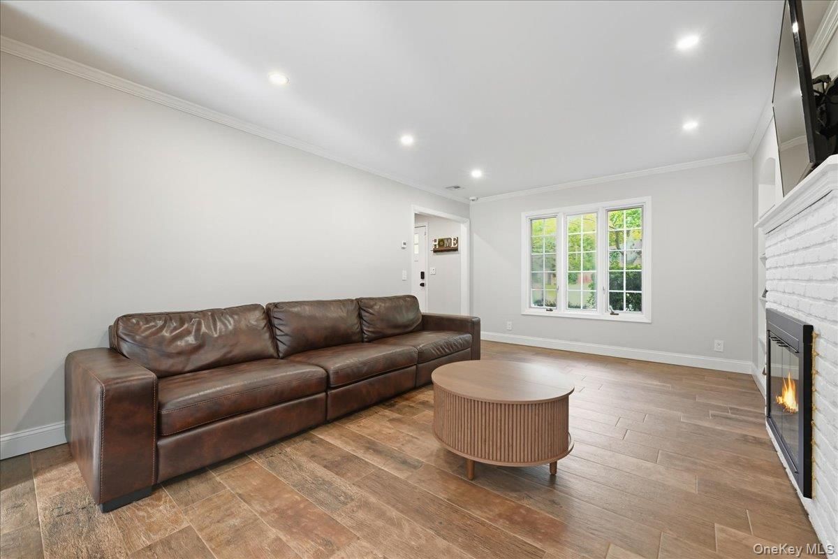 Fireplace, Interior, Living room, Recessed Lighting, Wood Texture Flooring