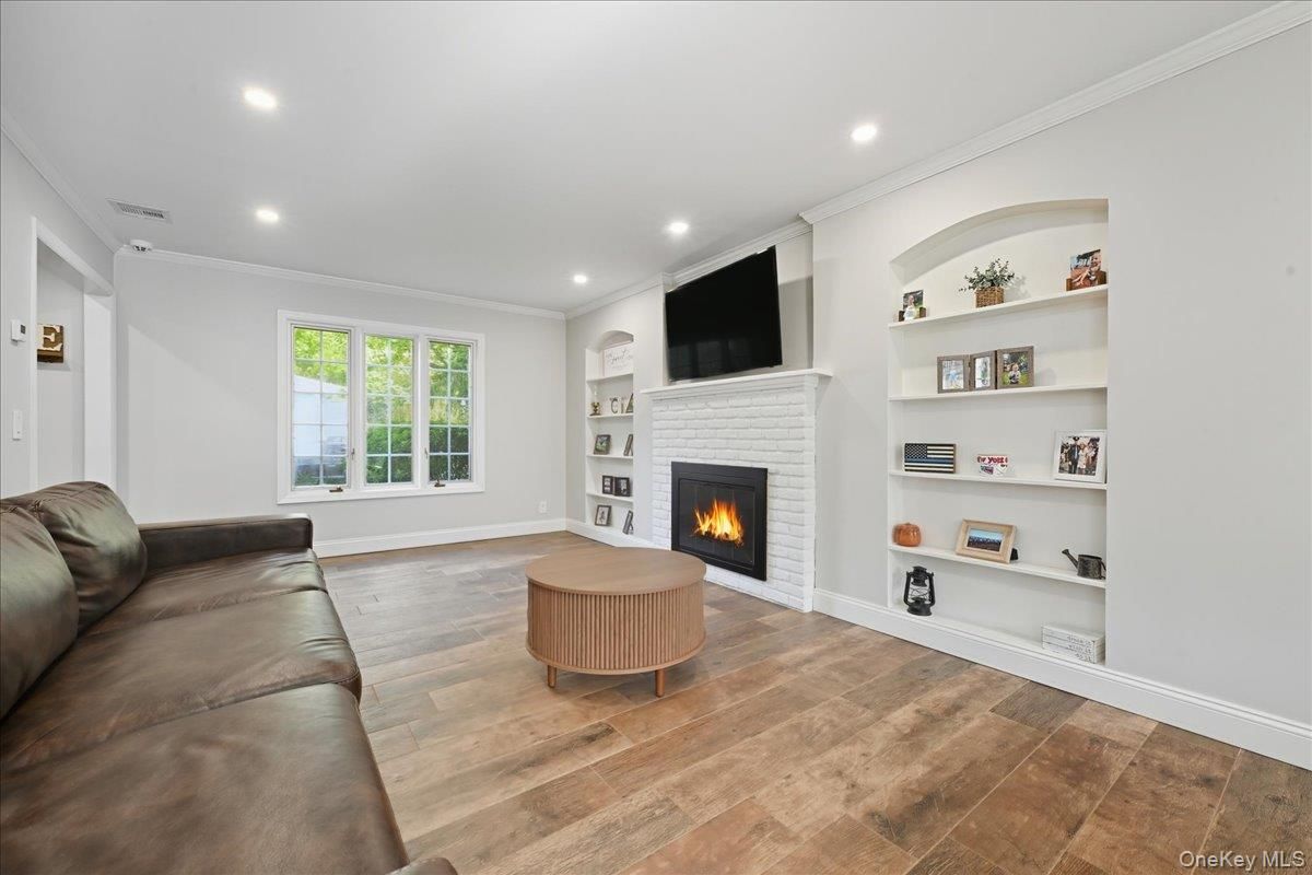 Fireplace, Interior, Living room, Recessed Lighting, Wood Texture Flooring