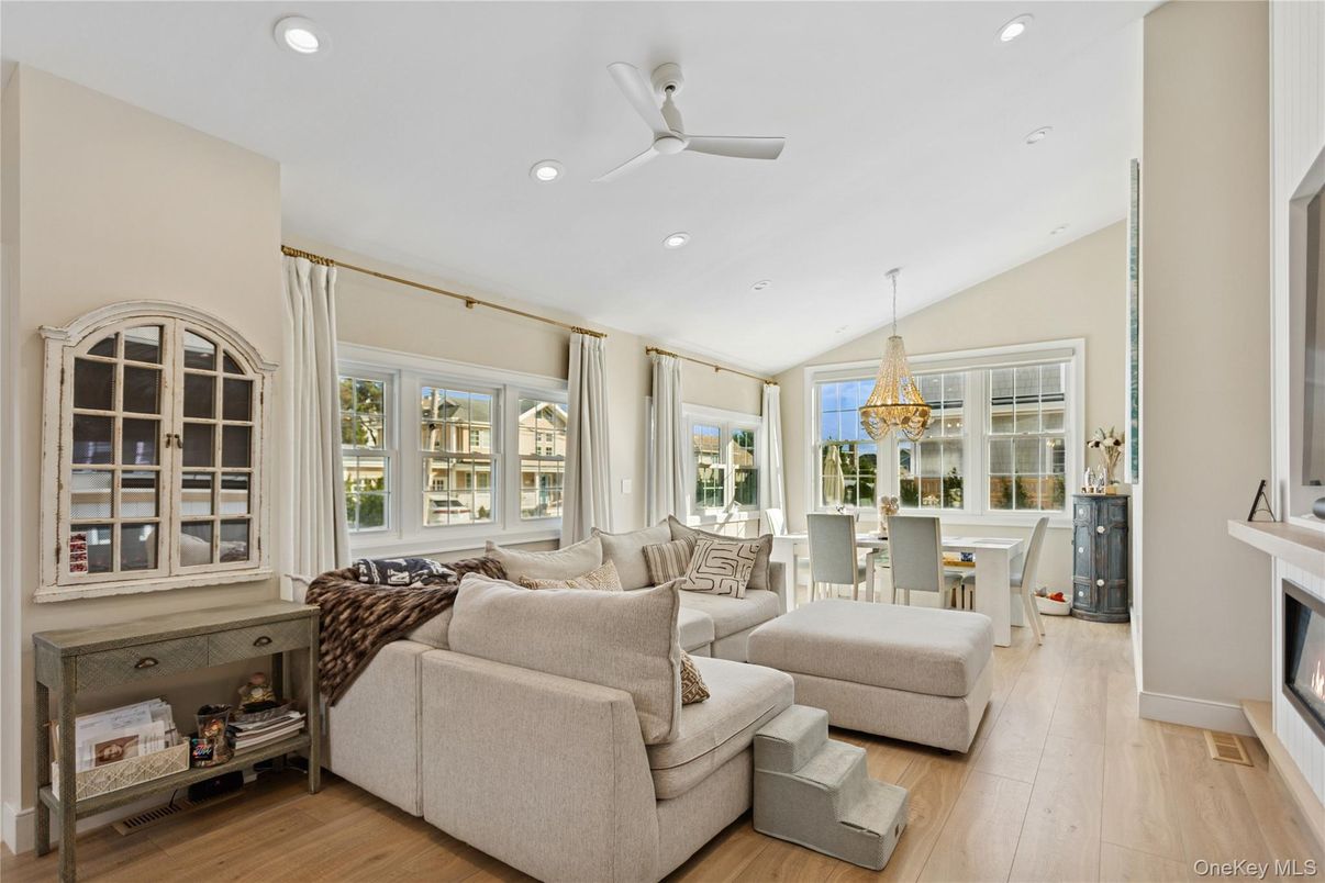 Chandelier, Dining room, Fireplace, Interior, Living room, Recessed Lighting, Wood Texture Flooring