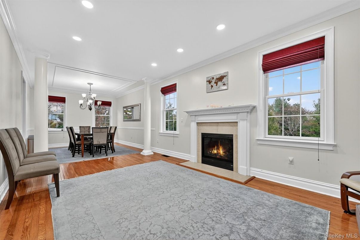 Chandelier, Dining room, Fireplace, Interior, Recessed Lighting, Wood Texture Flooring