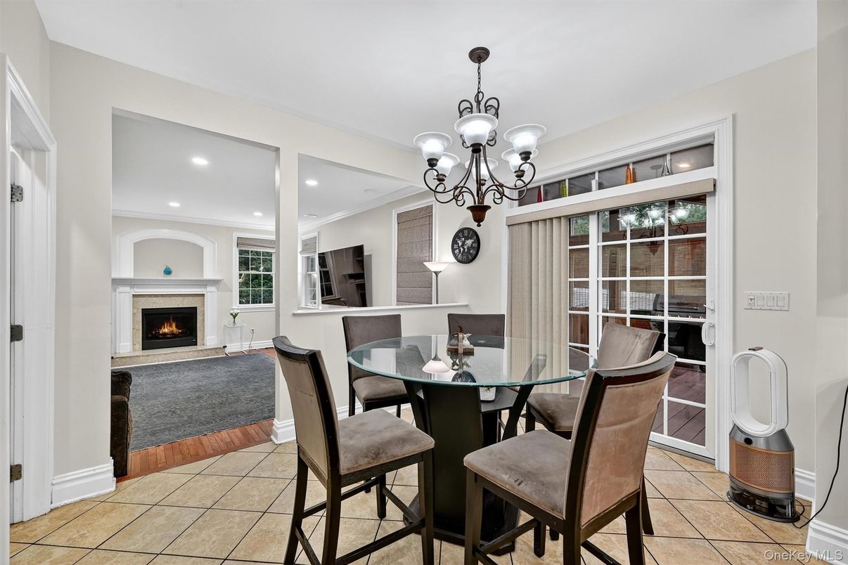 Chandelier, Dining room, Fireplace, Interior, Recessed Lighting, Wood Texture Flooring