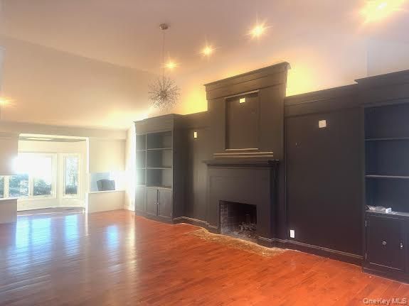 Empty room, Fireplace, Interior, Pendant Lights, Wood Texture Flooring