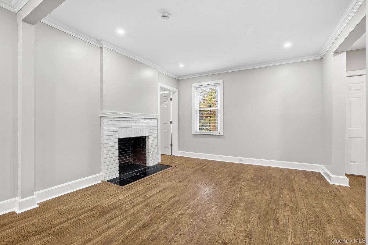 Empty room, Fireplace, Interior, Recessed Lighting, Wood Texture Flooring