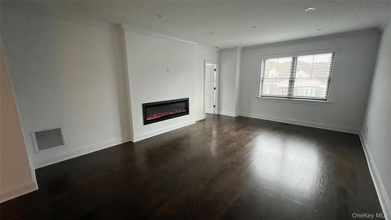 Empty room, Fireplace, Interior, Recessed Lighting, Wood Texture Flooring