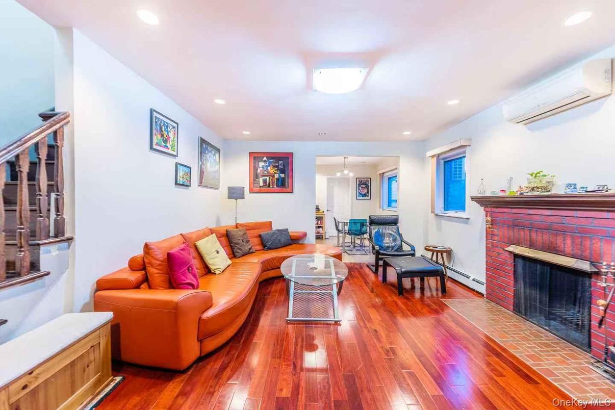Dining room, Fireplace, Interior, Living room, Pendant Lights, Recessed Lighting, Wood Texture Flooring