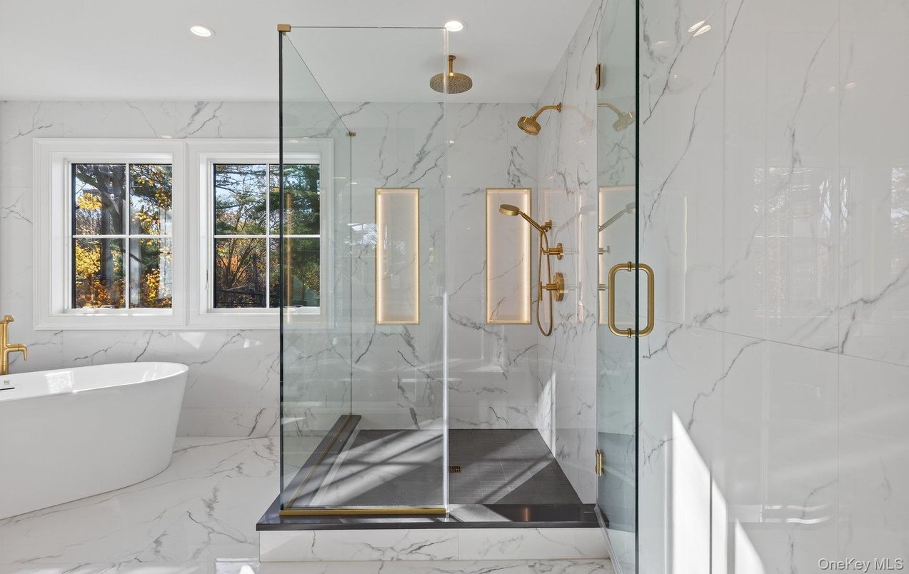 Bathroom, Free Standing Baths, Glass Shower, Interior, Marble, Marble Walls, Recessed Lighting