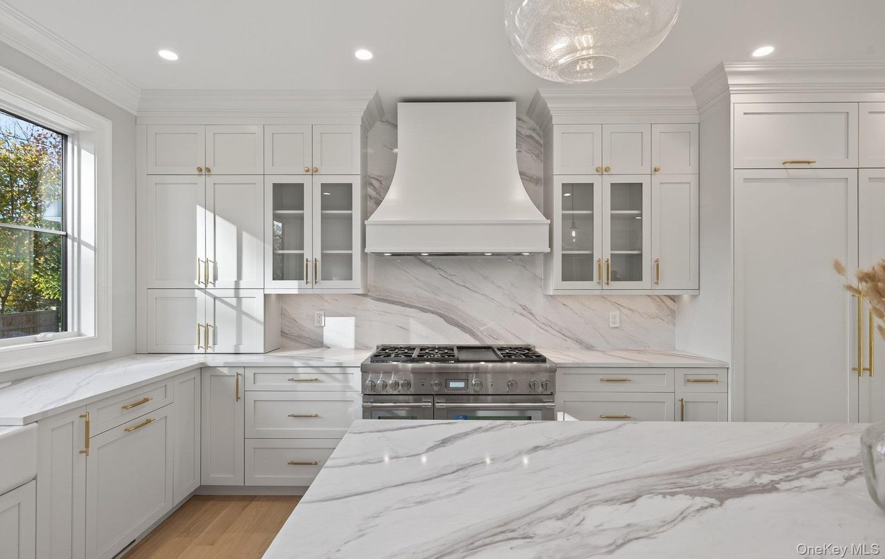 Interior, Kitchen, Marble Walls, Recessed Lighting, Stainless Steel Appliances, Wood Texture Flooring