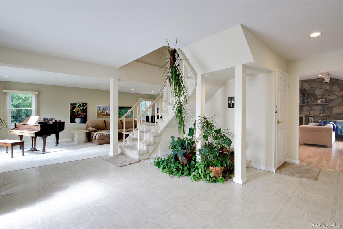 Fireplace, Interior, Piano, Recessed Lighting, Stone Walls, Wood Texture Flooring