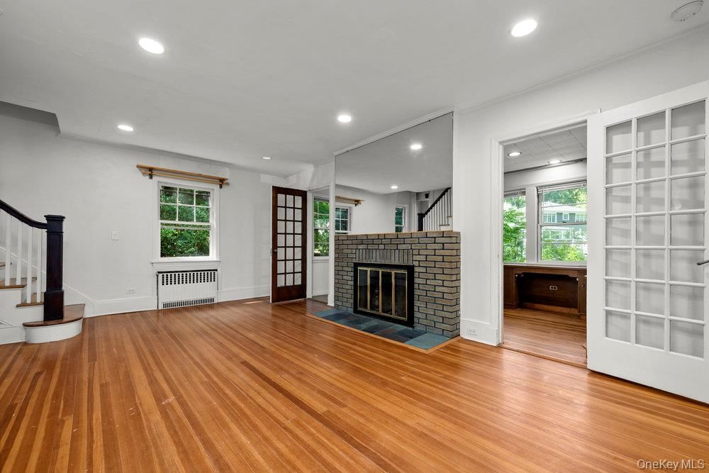 Empty room, Fireplace, Interior, Recessed Lighting, Wood Texture Flooring