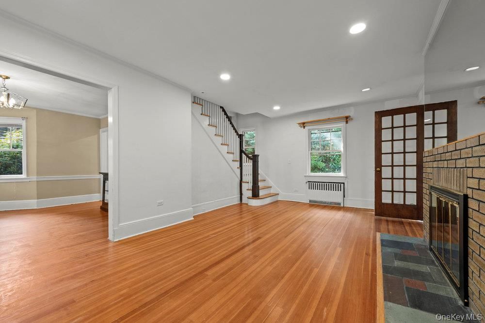 Empty room, Fireplace, Interior, Recessed Lighting, Wood Texture Flooring