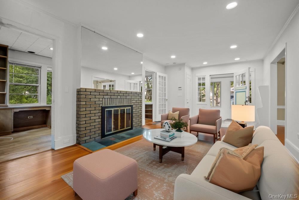 Fireplace, Interior, Living room, Recessed Lighting, Wood Texture Flooring