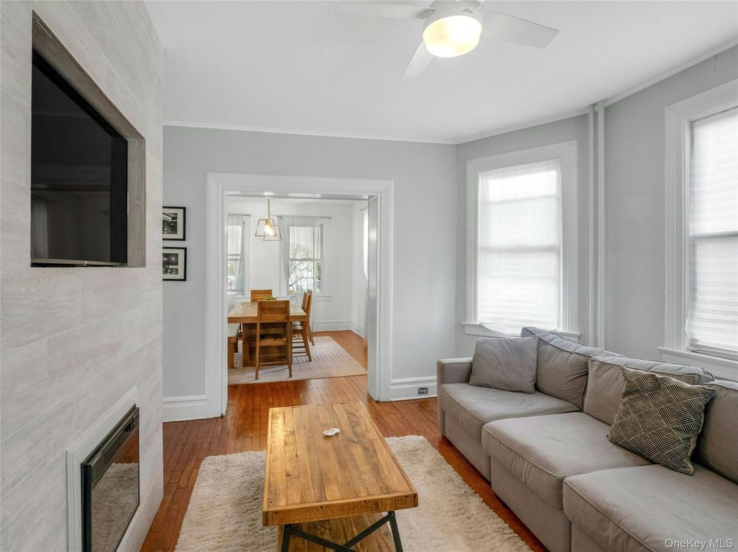 Dining room, Fireplace, Interior, Living room, Pendant Lights, Wood Texture Flooring