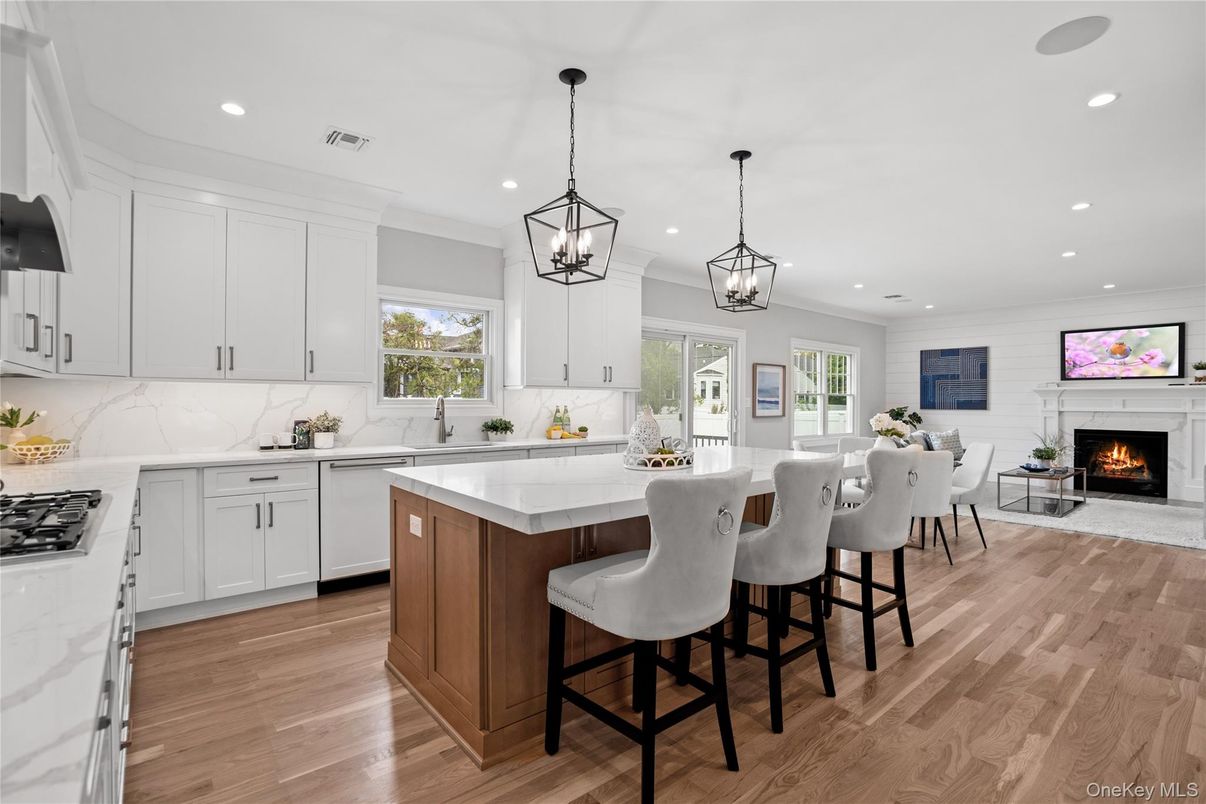 Dining room, Fireplace, Interior, Kitchen, Pendant Lights, Recessed Lighting, Wood Texture Flooring