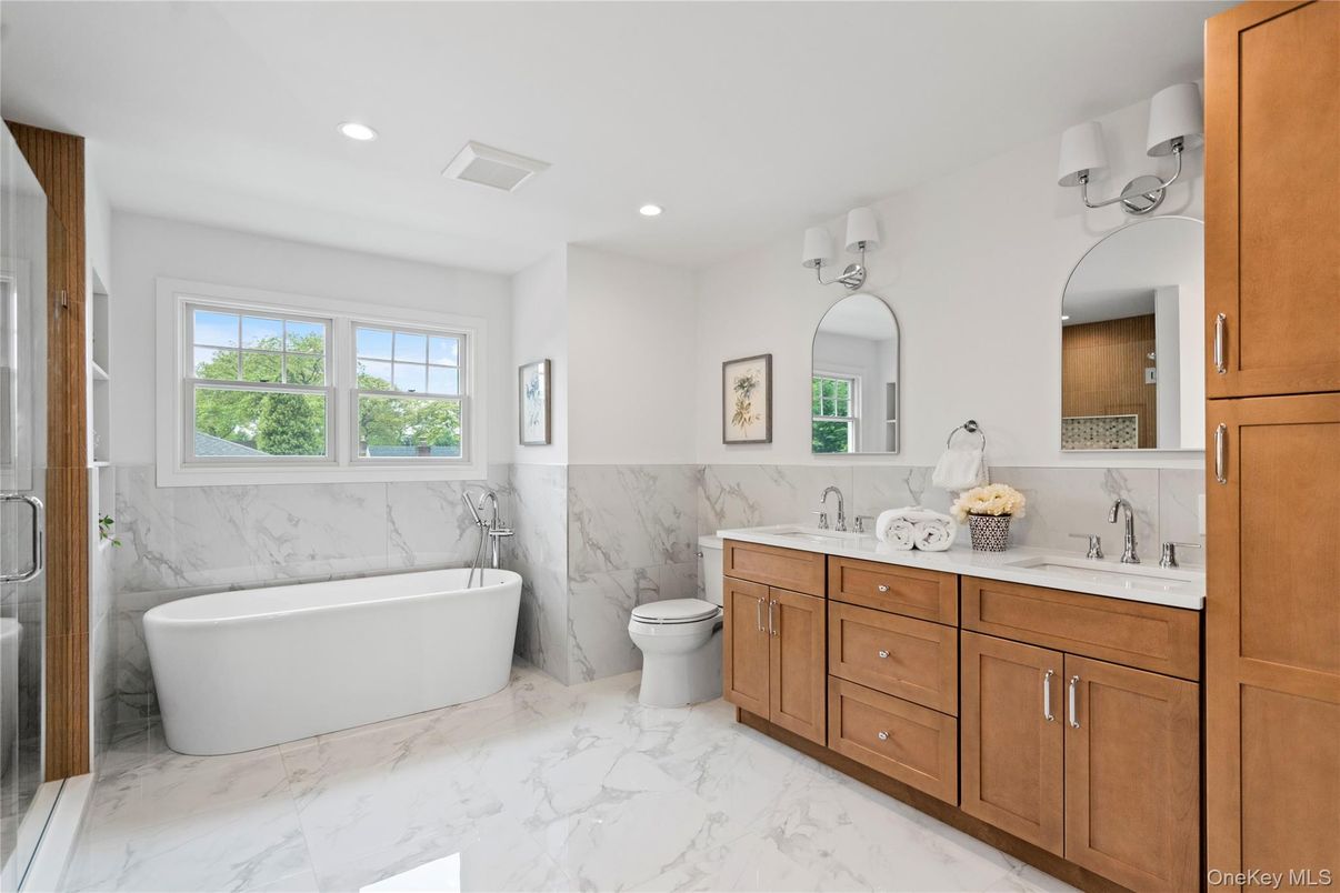 Bathroom, Dual Sink Vanities, Free Standing Baths, Interior, Marble, Marble Walls, Recessed Lighting