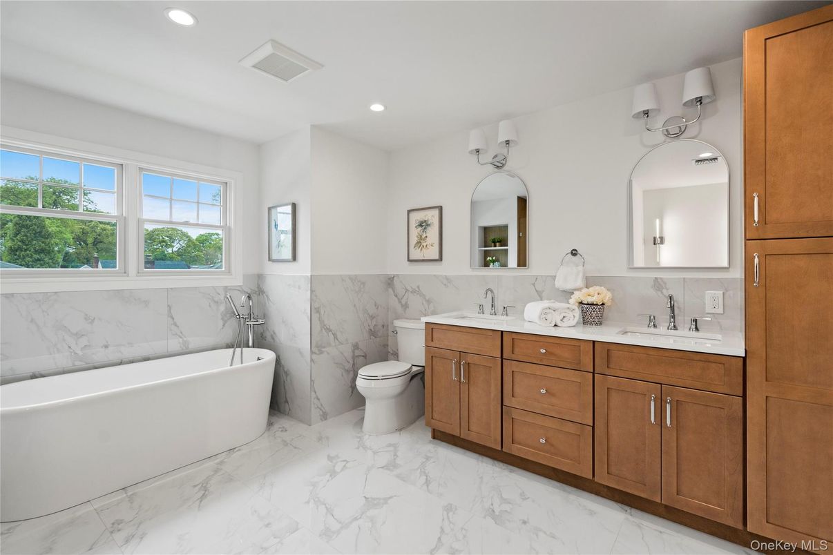 Bathroom, Dual Sink Vanities, Free Standing Baths, Interior, Marble, Marble Walls, Recessed Lighting