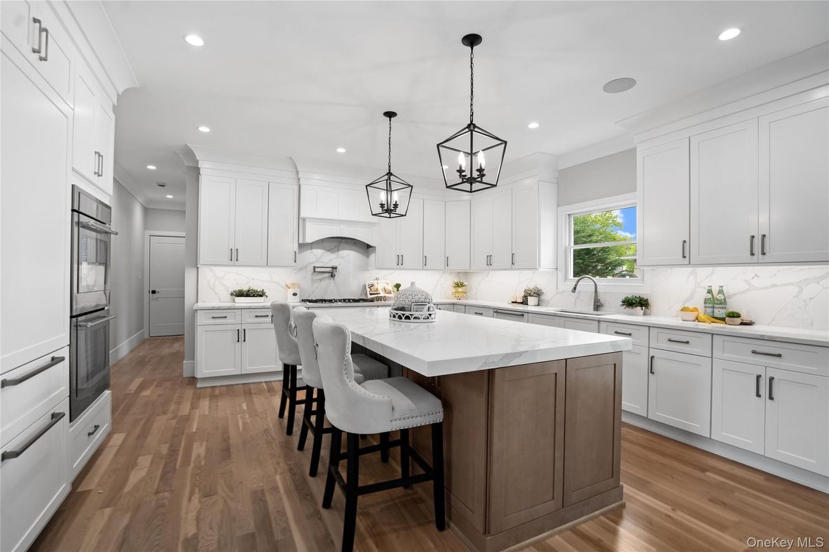 Interior, Kitchen, Marble Walls, Pendant Lights, Recessed Lighting, Wood Texture Flooring