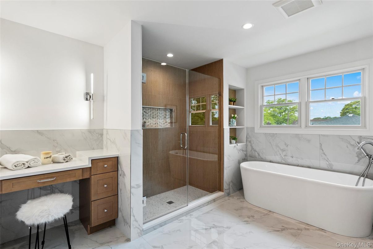 Bathroom, Free Standing Baths, Glass Shower, Interior, Marble, Marble Walls, Recessed Lighting