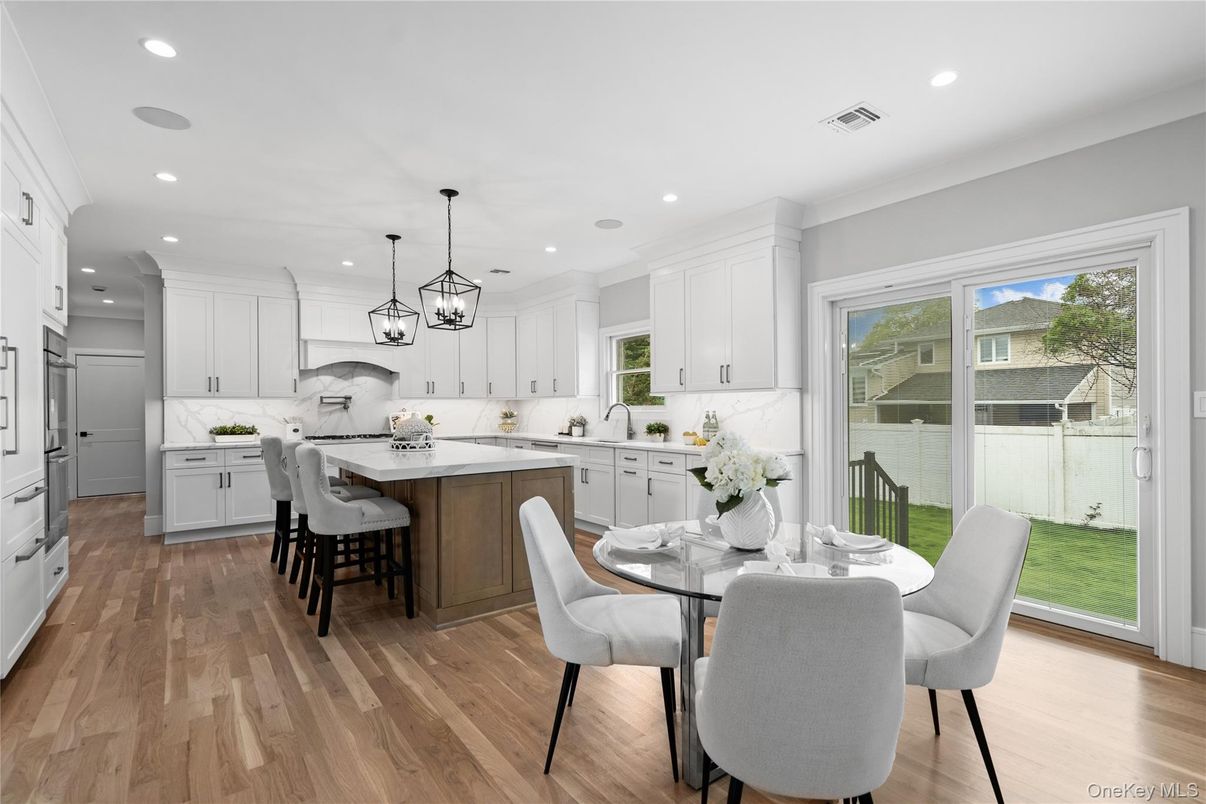 Dining room, Interior, Kitchen, Marble Walls, Pendant Lights, Recessed Lighting, Wood Texture Flooring