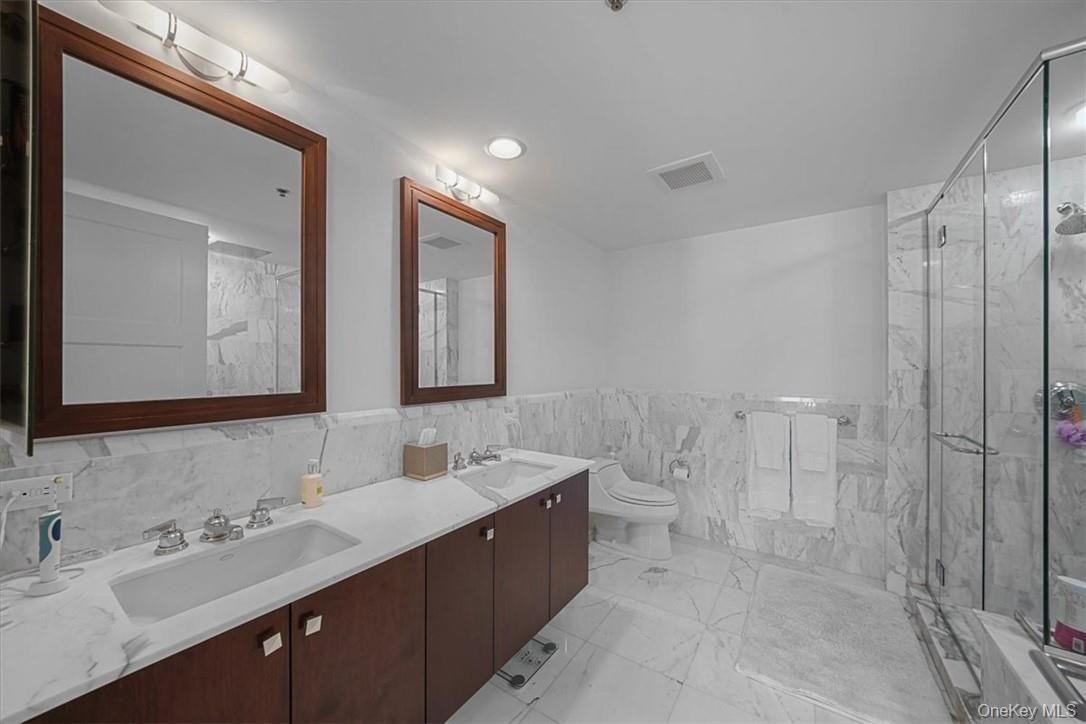 Bathroom, Dual Sink Vanities, Glass Shower, Interior, Marble, Marble Walls