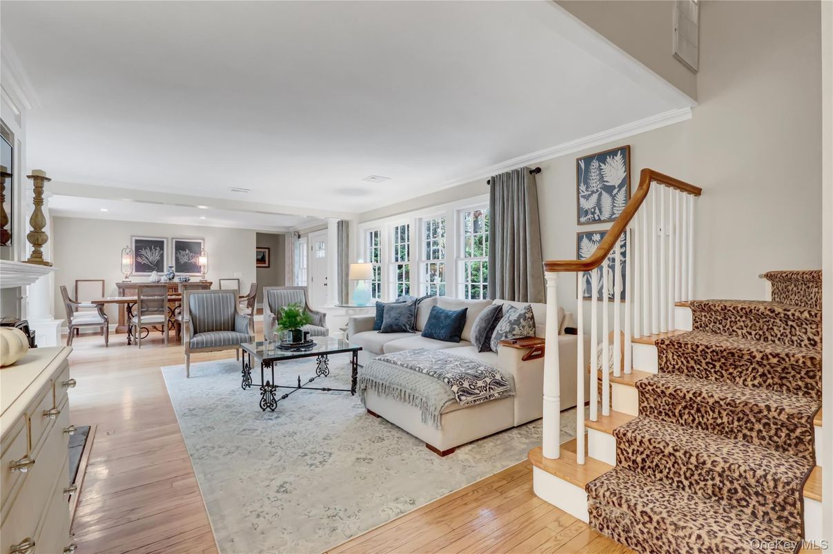 Dining room, Fireplace, Interior, Living room, Recessed Lighting, Wood Texture Flooring