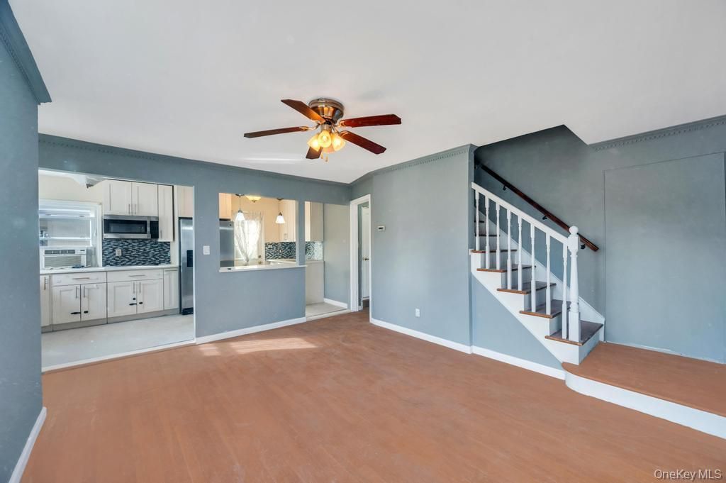 Empty room, Interior, Kitchen, Stainless Steel Appliances, Wood Texture Flooring